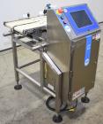 Used Loma LCW-3000 Belt Checkweigher with Reject. Up to 6.6 lbs capacity.